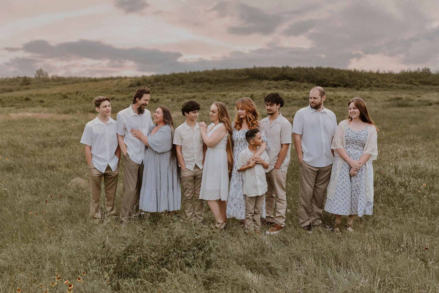 Extended family photography session featuring grandparents and grandchildren outdoors