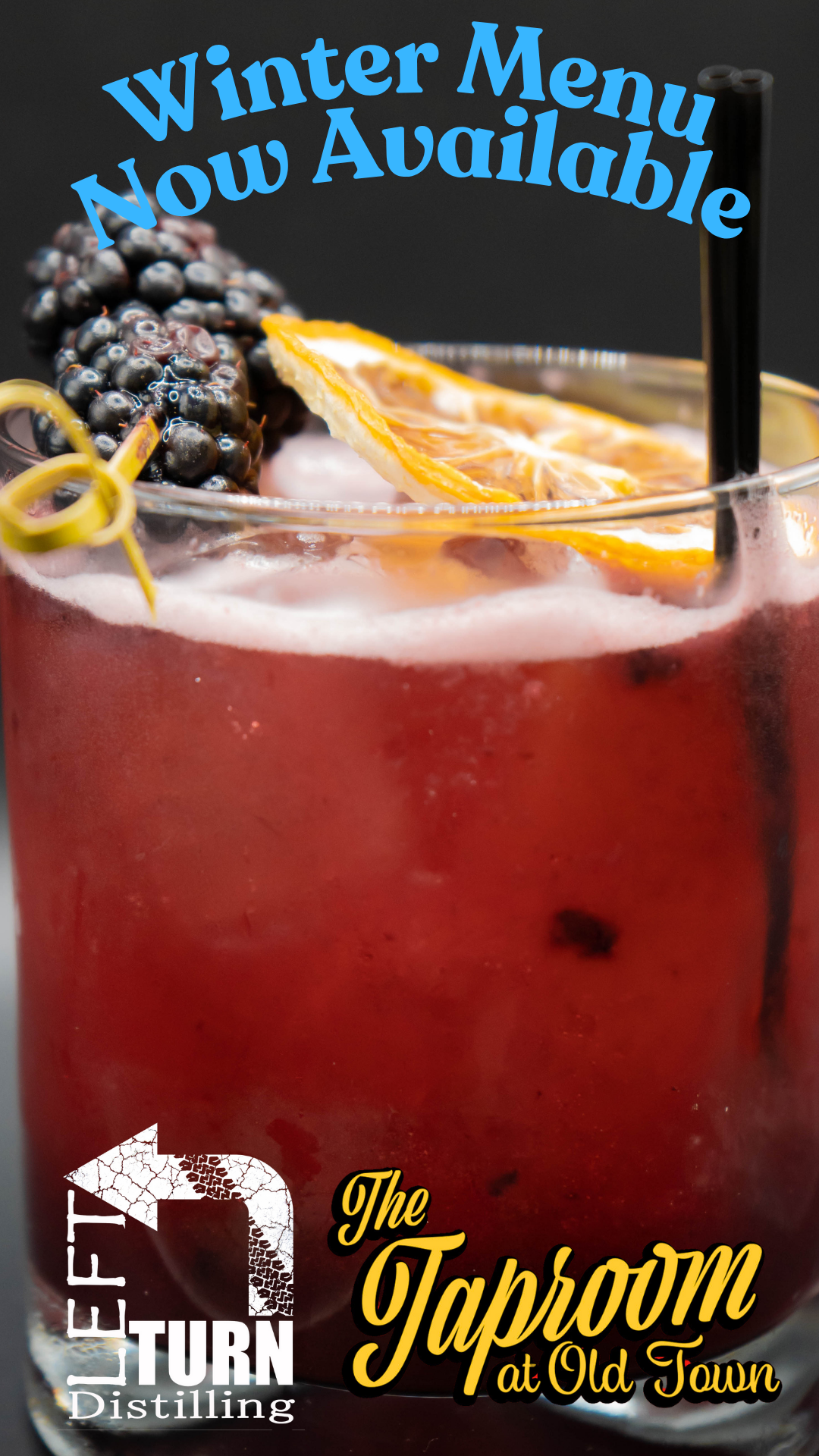 Red winter cocktail with garnishes served in stemware at a distillery bar.