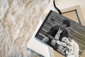 A series of vintage black and white photographs arranged in a horizontal row showing various candid moments.