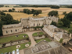 Aerial drone shots of historic Hammerwood Estate showcasing grand architecture and sprawling grounds in English countryside.