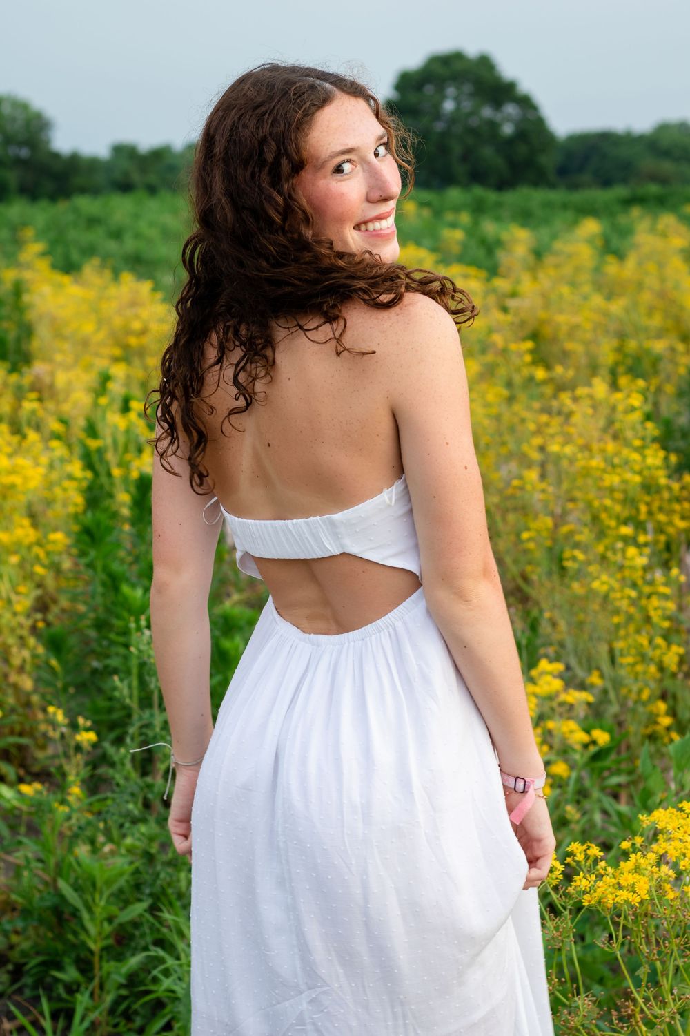 West Lafayette flower fields in the summer. Senior photos in the summer flowers. Wild flowers in field for senior photos. West Lafayette, IN