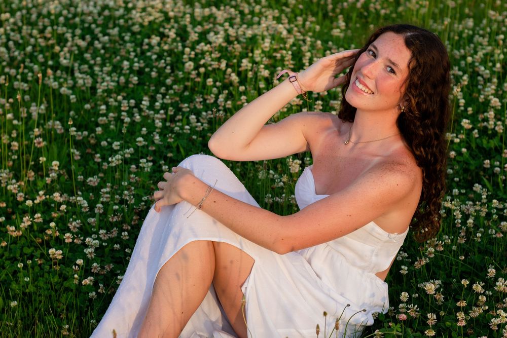 West Lafayette flower fields in the summer. Senior photos in the summer flowers. Wild flowers in field for senior photos. West Lafayette, IN