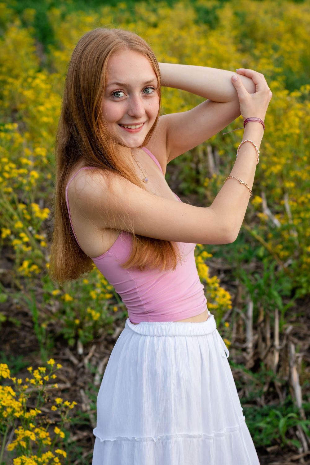 Natural senior photos in a garden. Senior photos with wildflowers. Portraits in a field of flowers.Senior photos in a flower field Lafayette