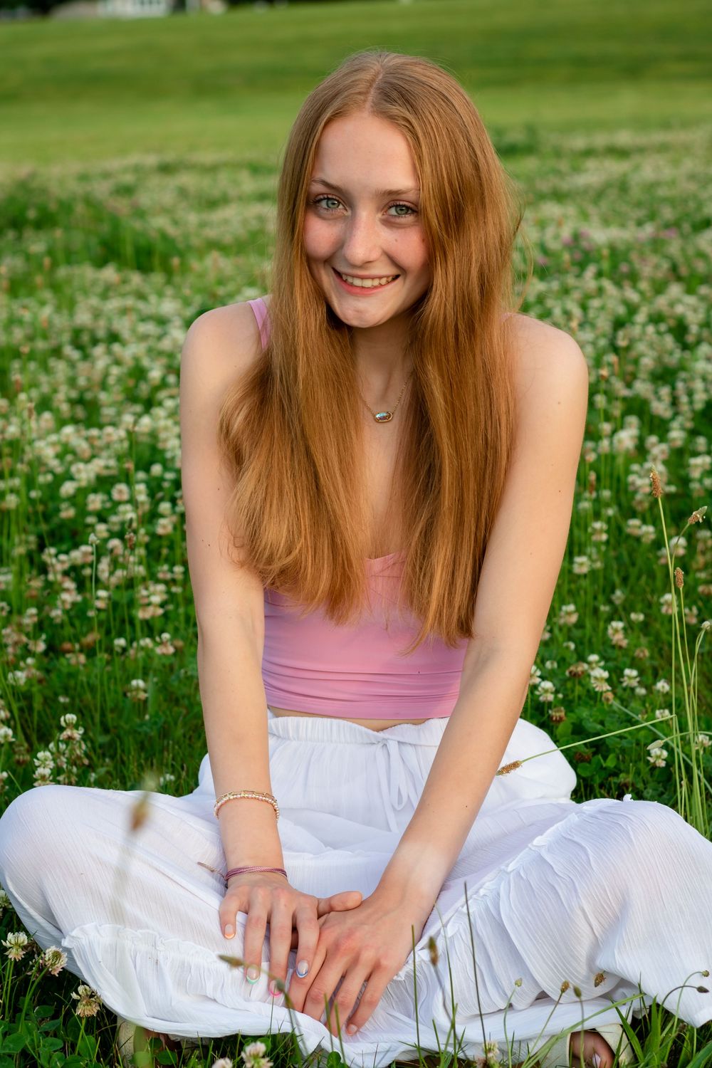 Natural senior photos in a garden. Senior photos with wildflowers. Portraits in a field of flowers. Senior photos in a flower field