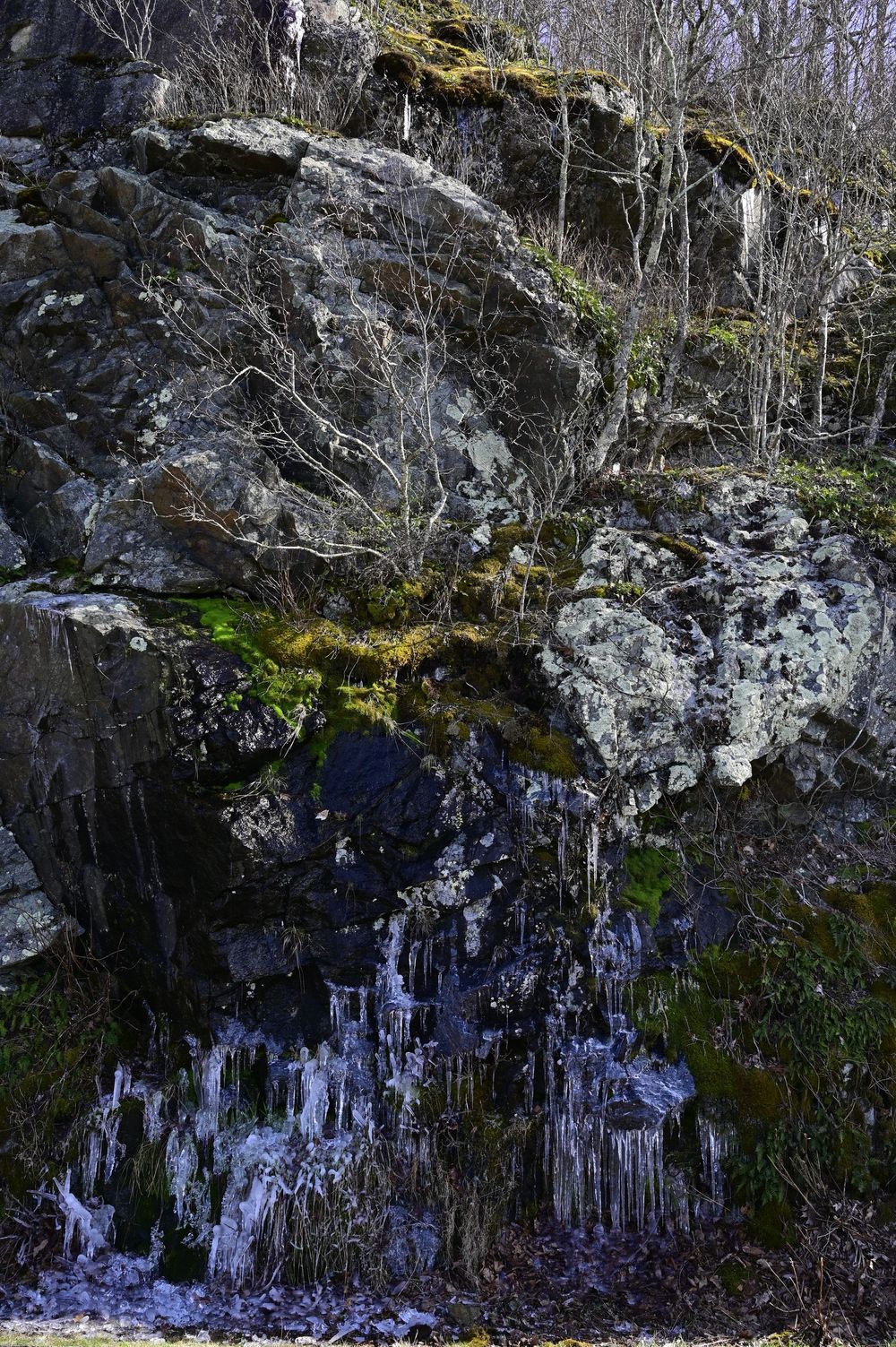 Water and ice cascading down rock face in Shenandoah national park