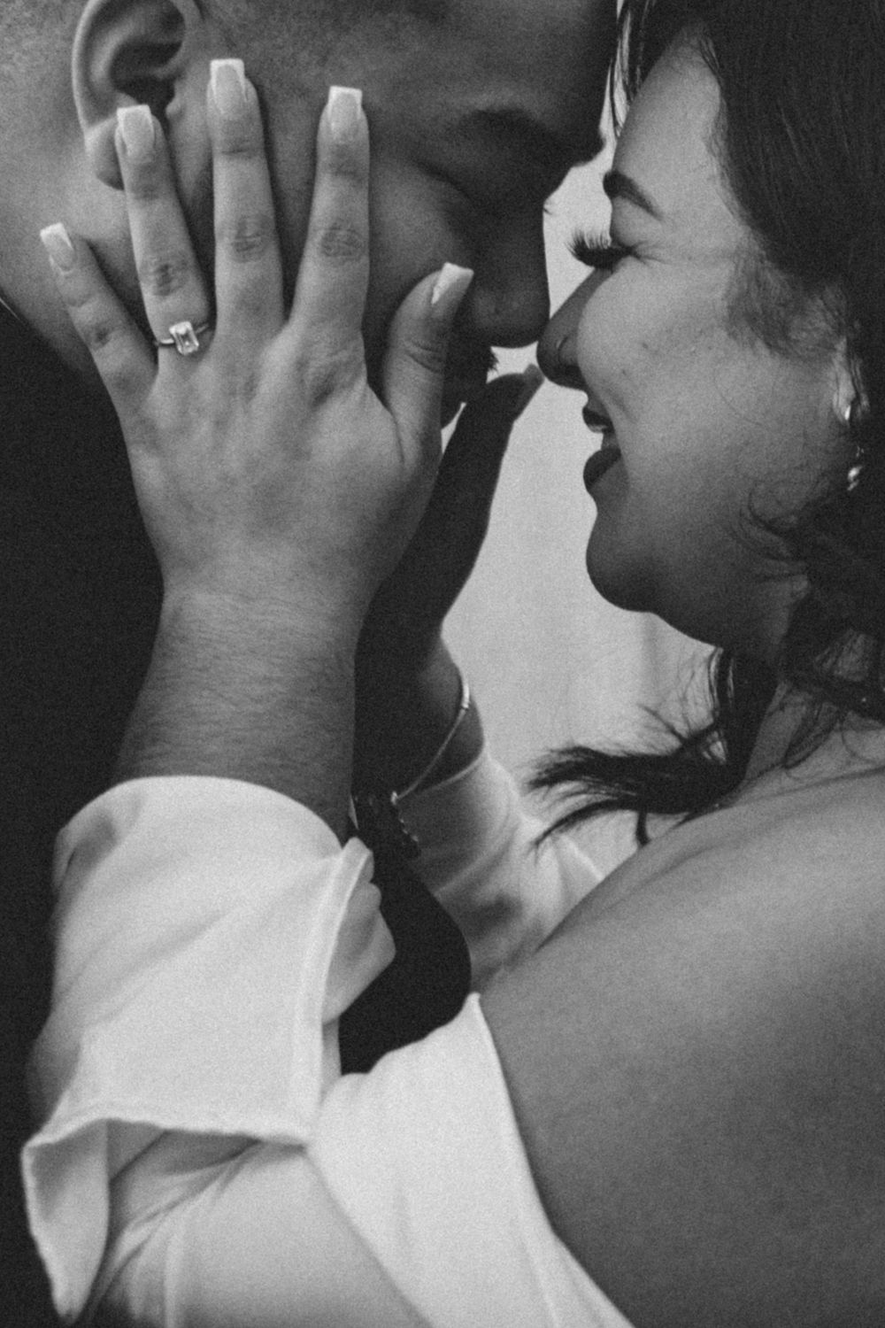 A series of romantic black and white photographs showing a tender embrace between two people in profile.