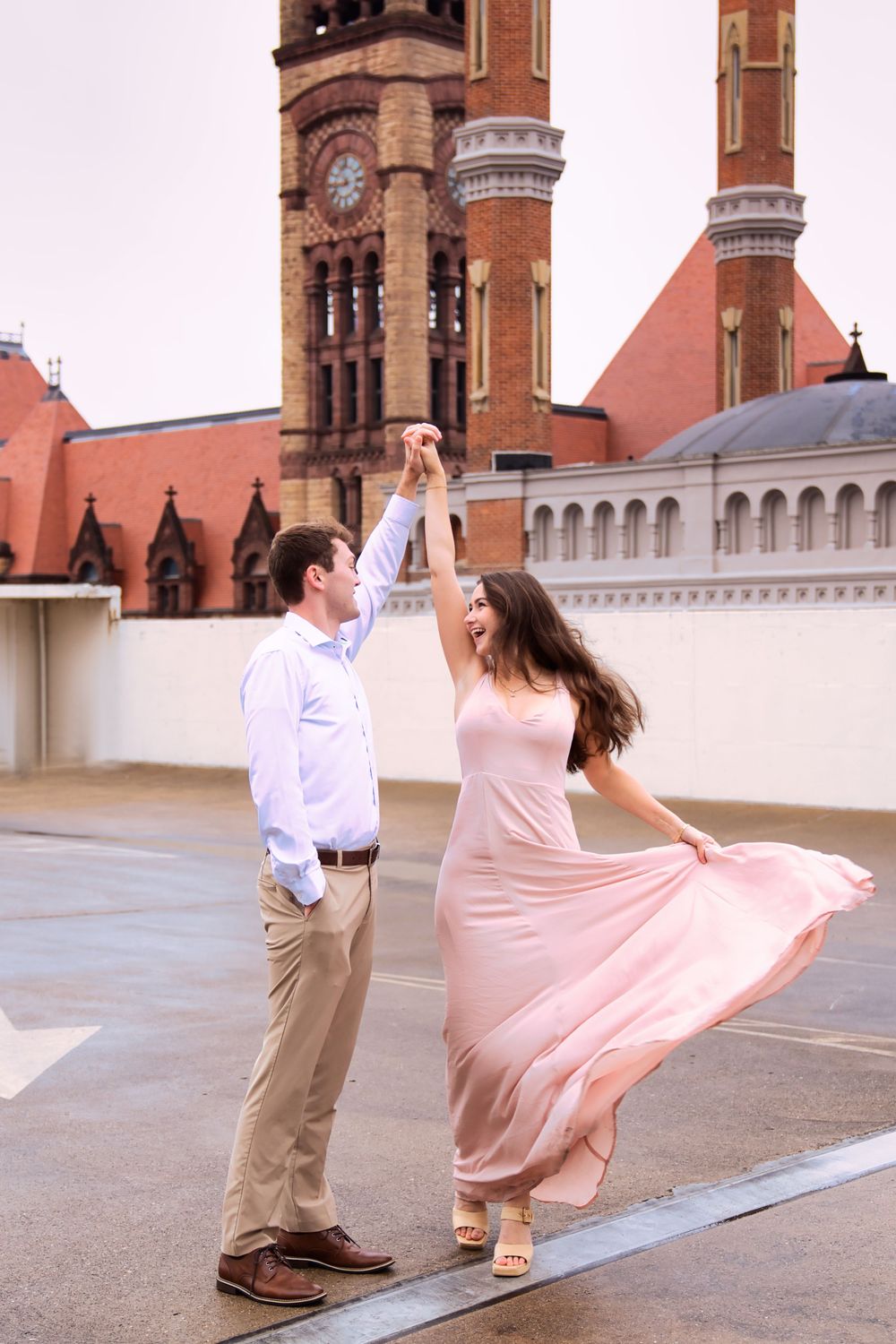 Downtown engagement locations for couples at downtown Cincinnati. Couple dancing on a rooftop : Cincinnati Wedding Photographer