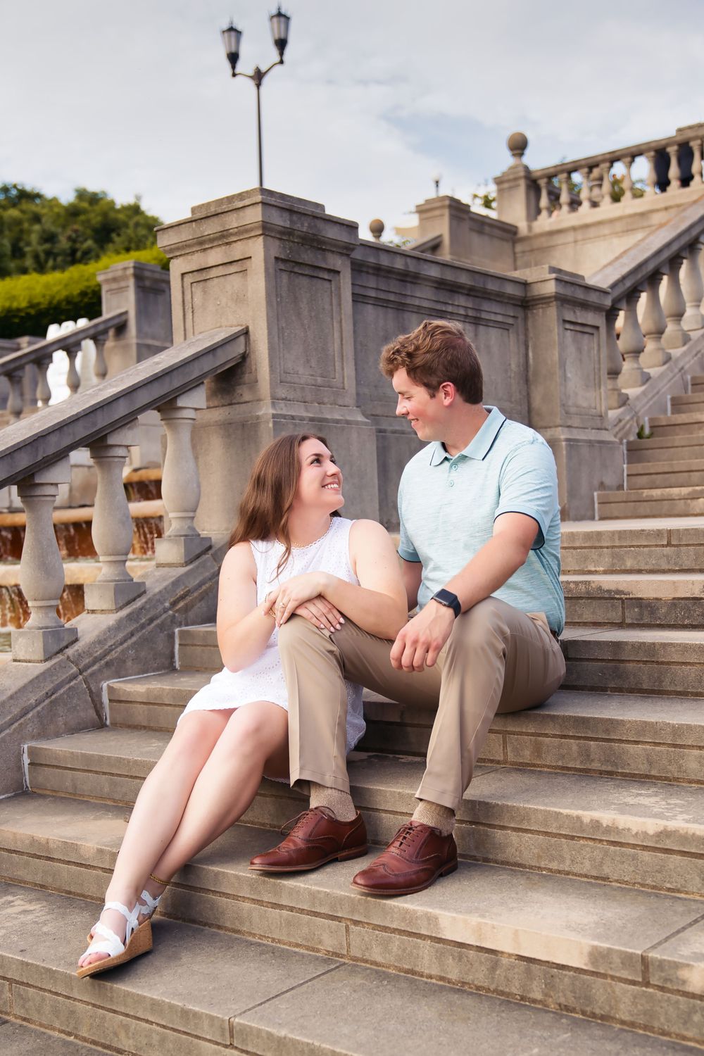 Downtown engagement locations for couples in Cincinnati. Emily and Rj sitting on steps at Ault Park: Cincinnati Wedding Photographer