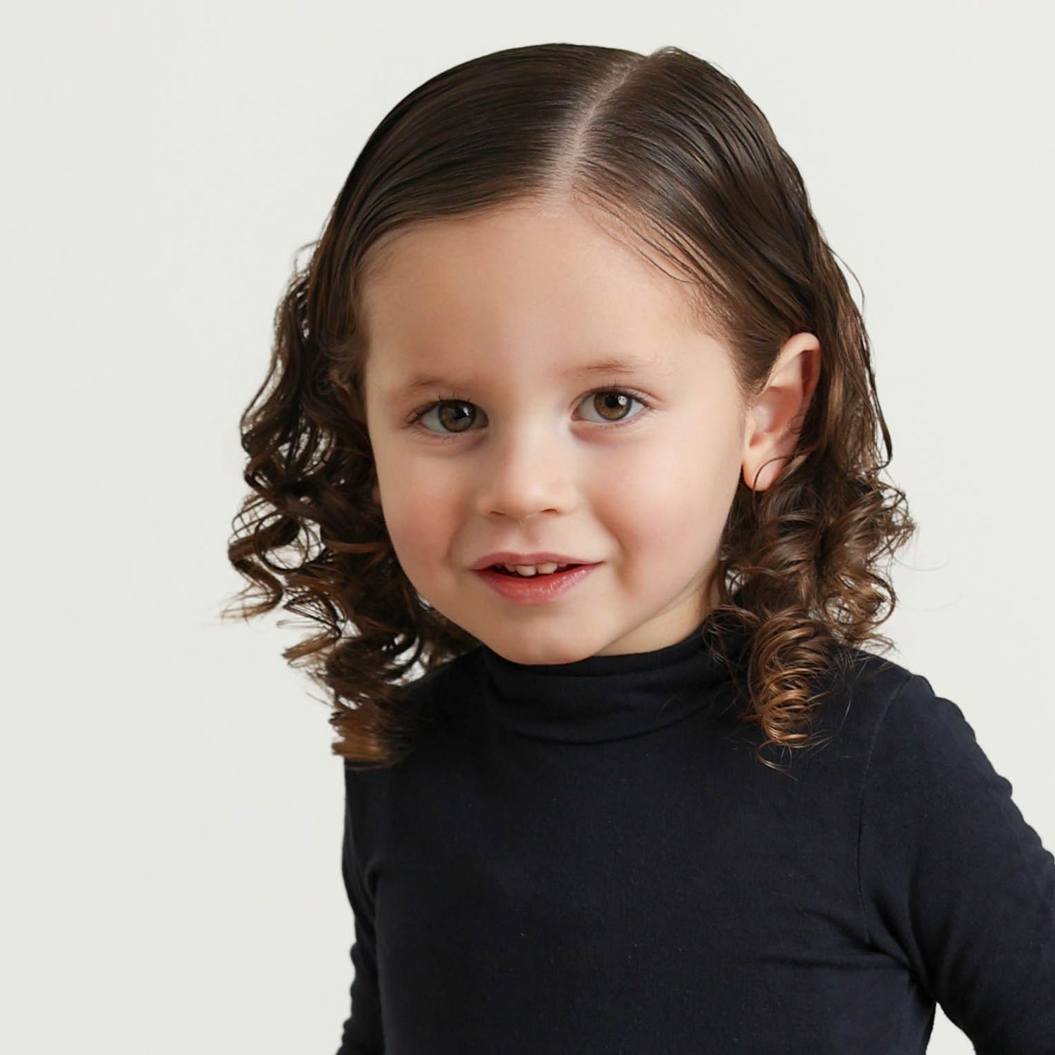 close up portrait of an upsherin boy with pretty curls taken at Gitty Strauss Photography's Lakewood, NJ studio