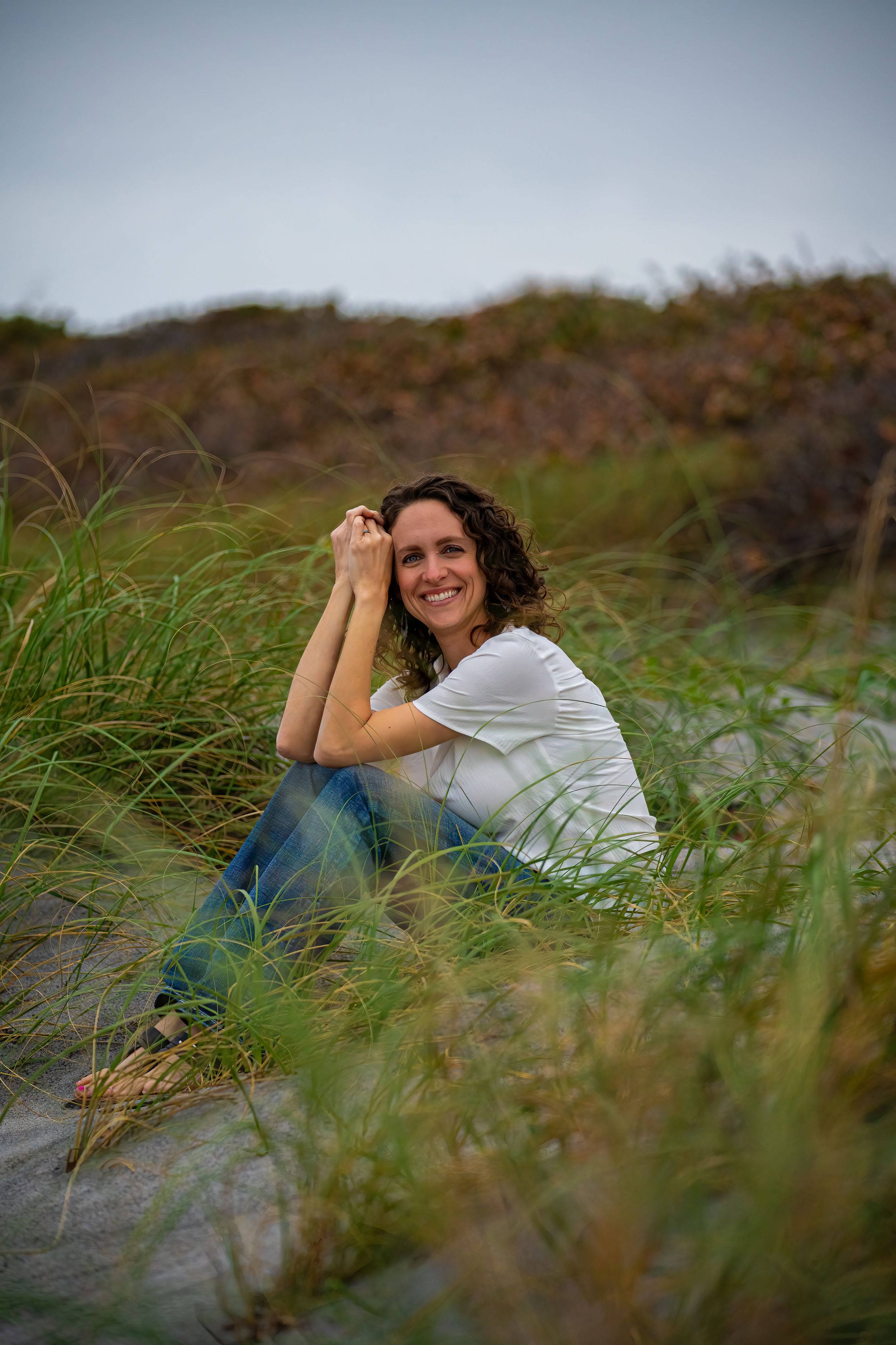 Casey Thomas photography posing in the brush of jupiter beach park in Jupiter, Florida.