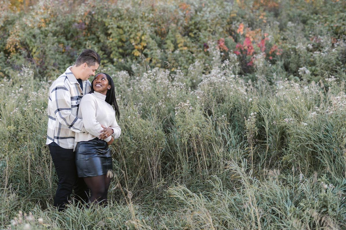 Candid and heartfelt engagement session in Edmonton, showcasing authentic moments between a couple.