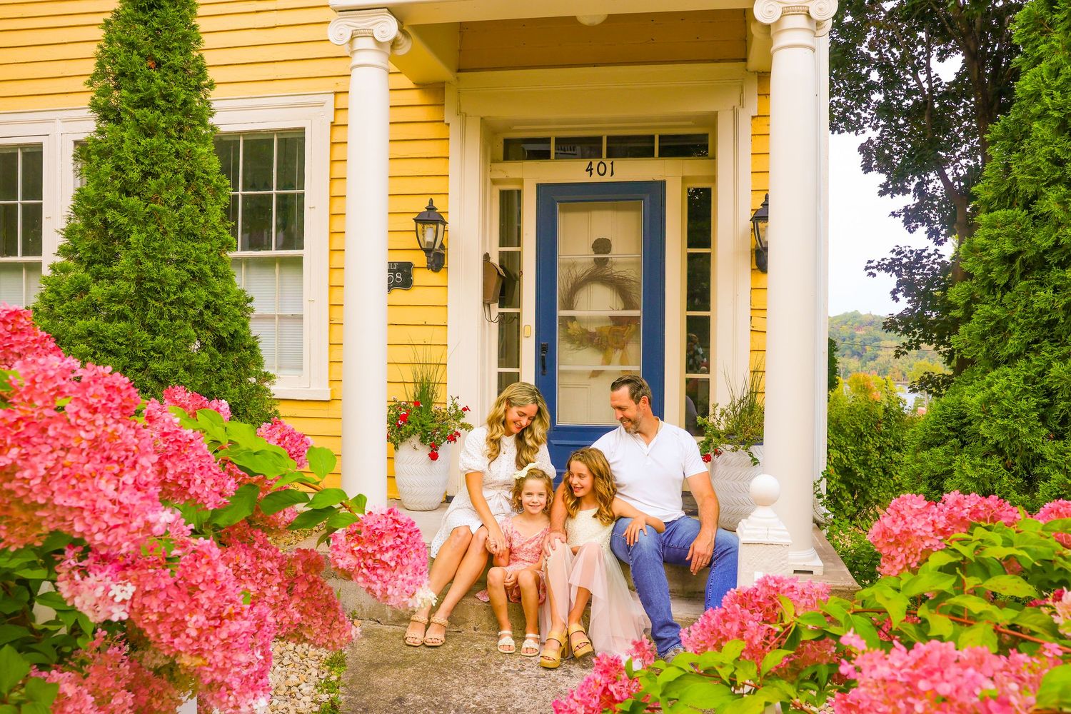 Family photos at home on front porch.