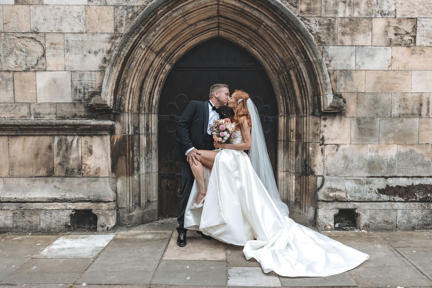 A guided couple photo during couple wedding day portraits on their wedding day.