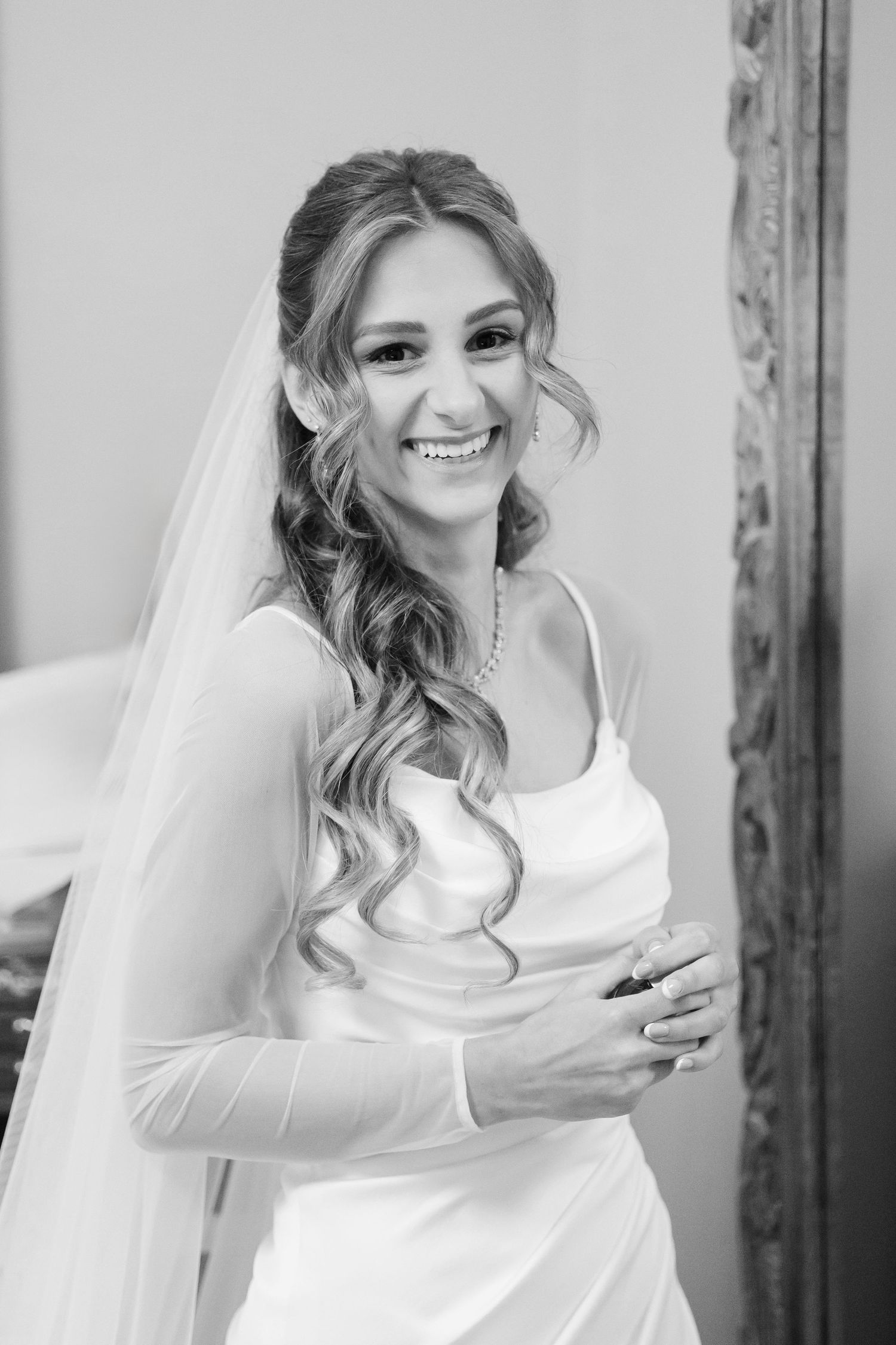 Bride getting ready for wedding day captured by Tom Forrest Photography from Hudson, Ohio.