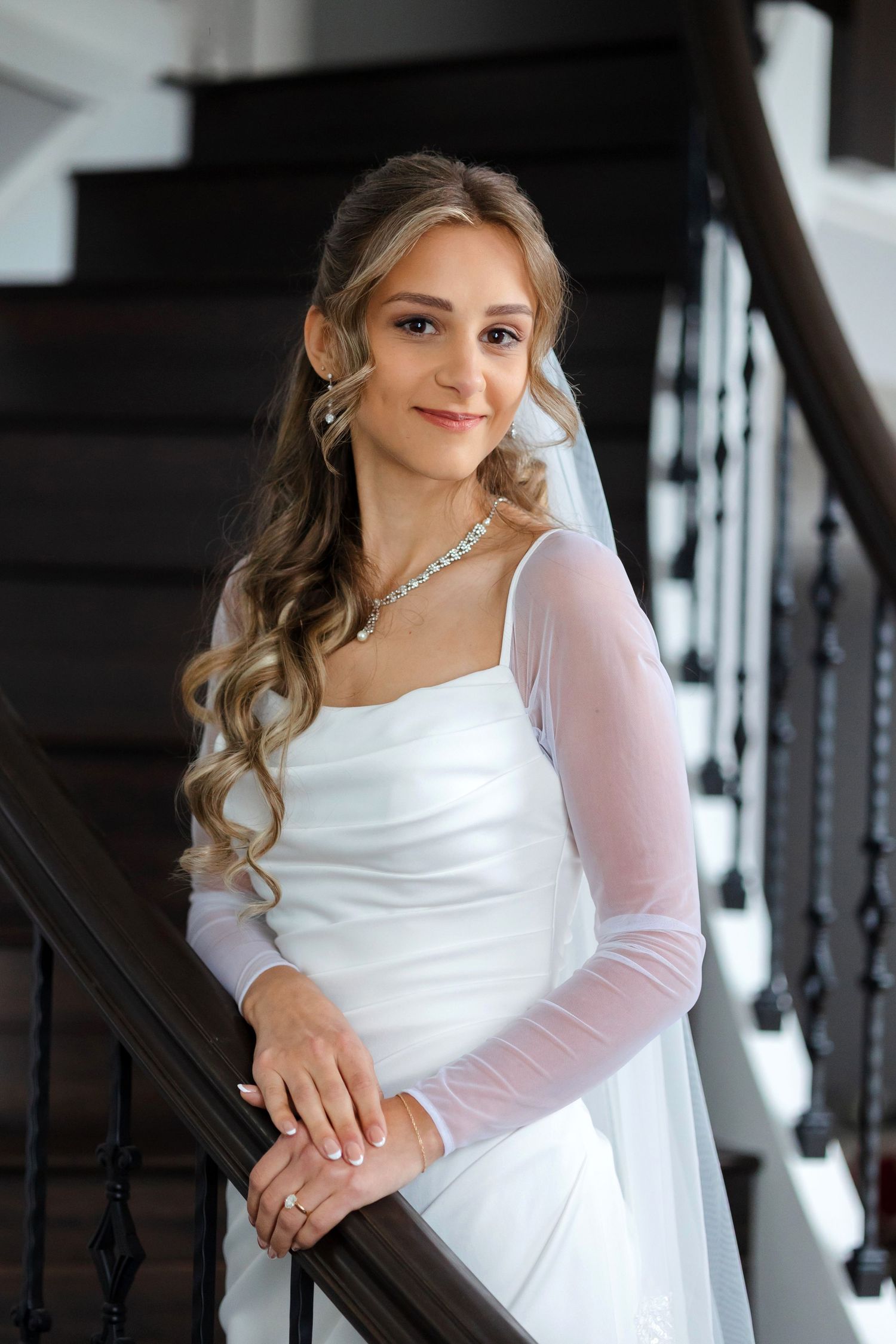 Relaxed portrait of bride at her family home captured by Tom Forrest Photography from Hudson, Ohio.
