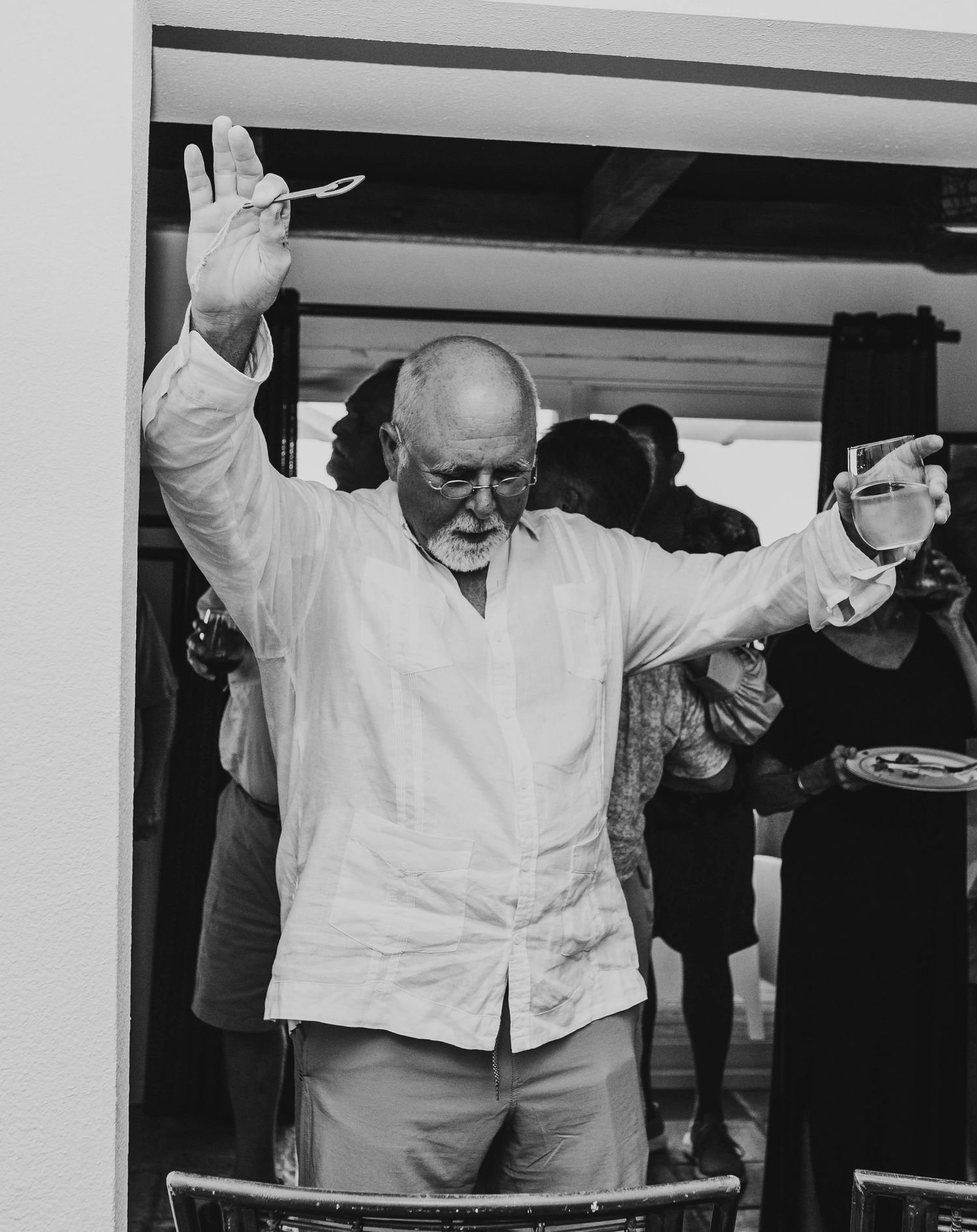 Black and white photo of man about to give speech at a 50th anniversary gathering during an event session in Matagorda TX