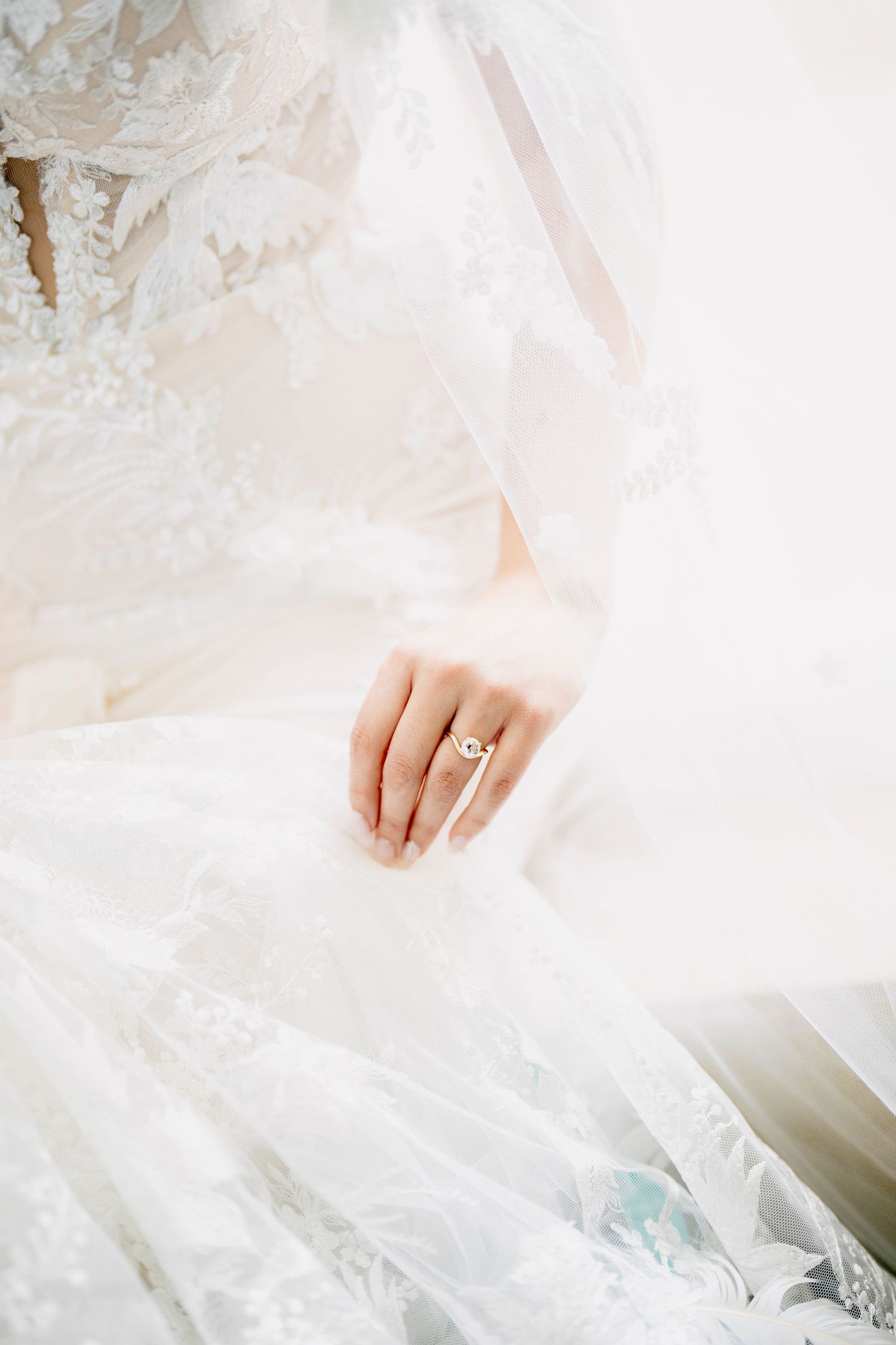 Delicate white tulle or sheer fabric with soft folds creates an ethereal, dreamy texture in natural light.