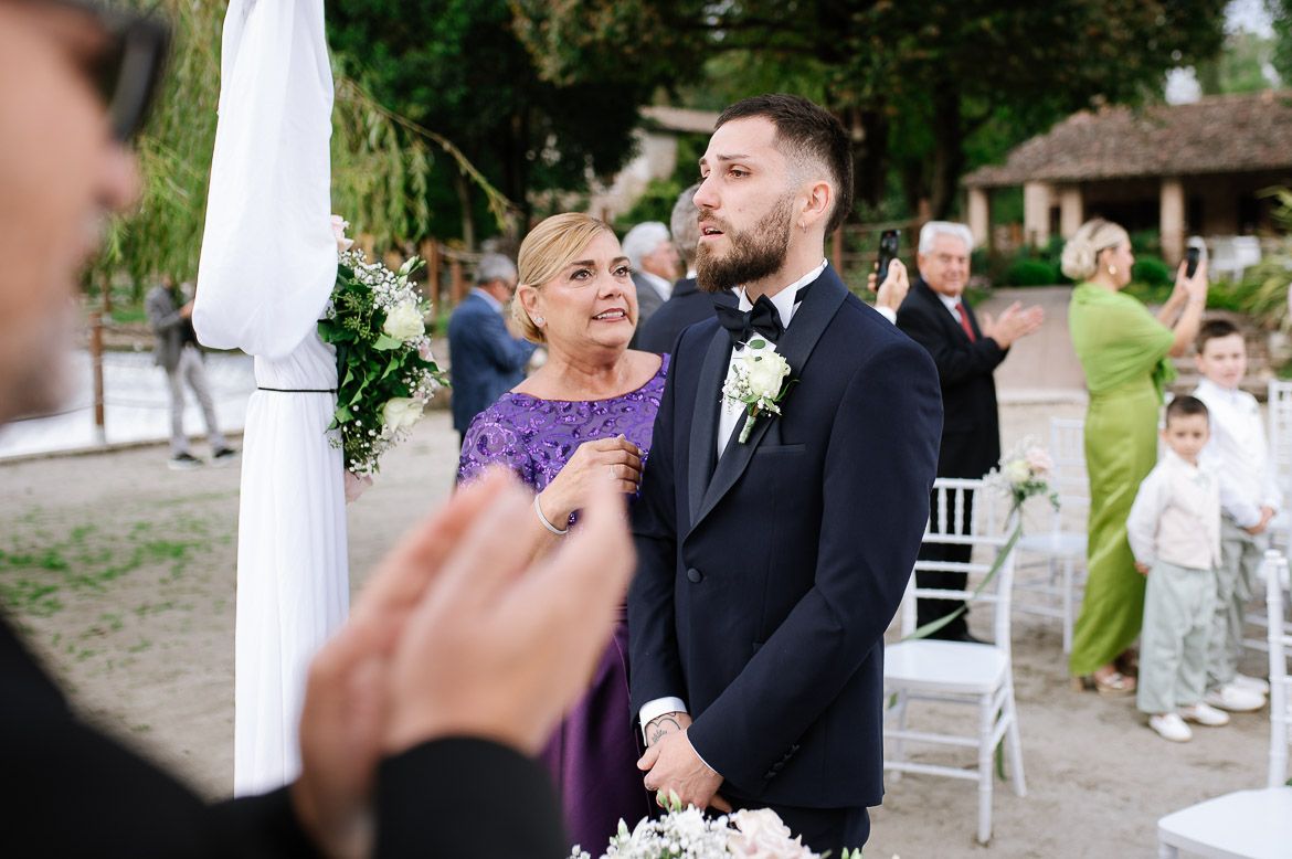 Candid moments of wedding guests during outdoor celebration.