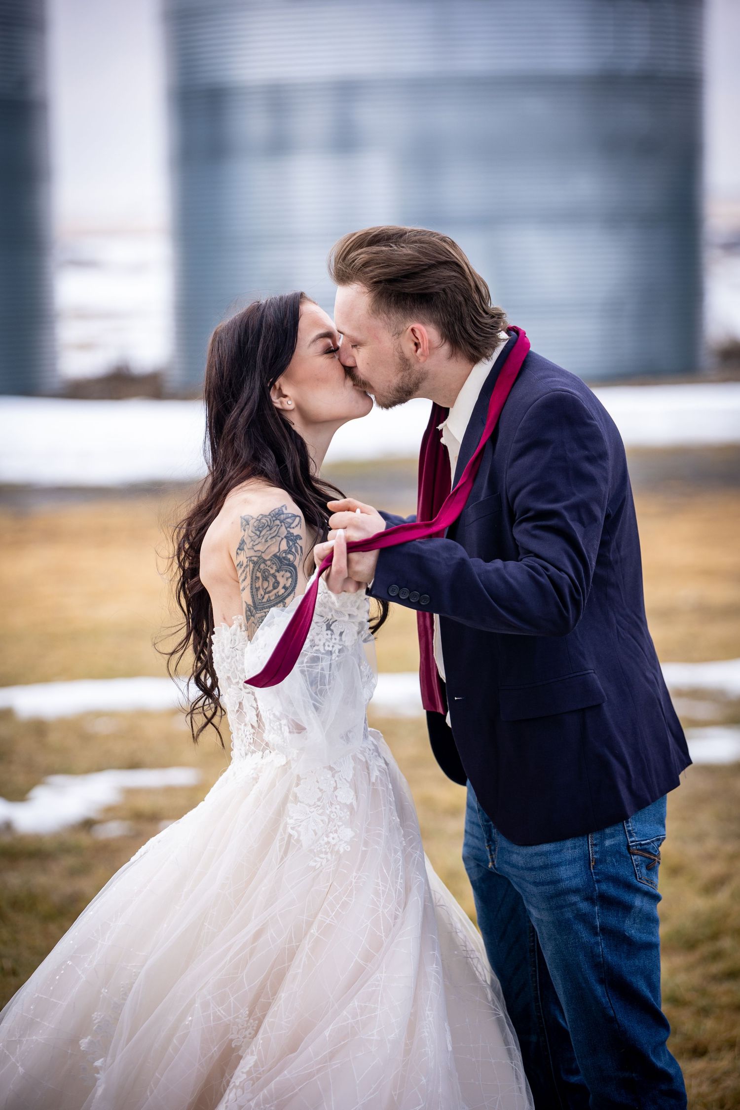 A romantic winter wedding photo sequence shows a couple in formal attire sharing an intimate kiss outdoors.