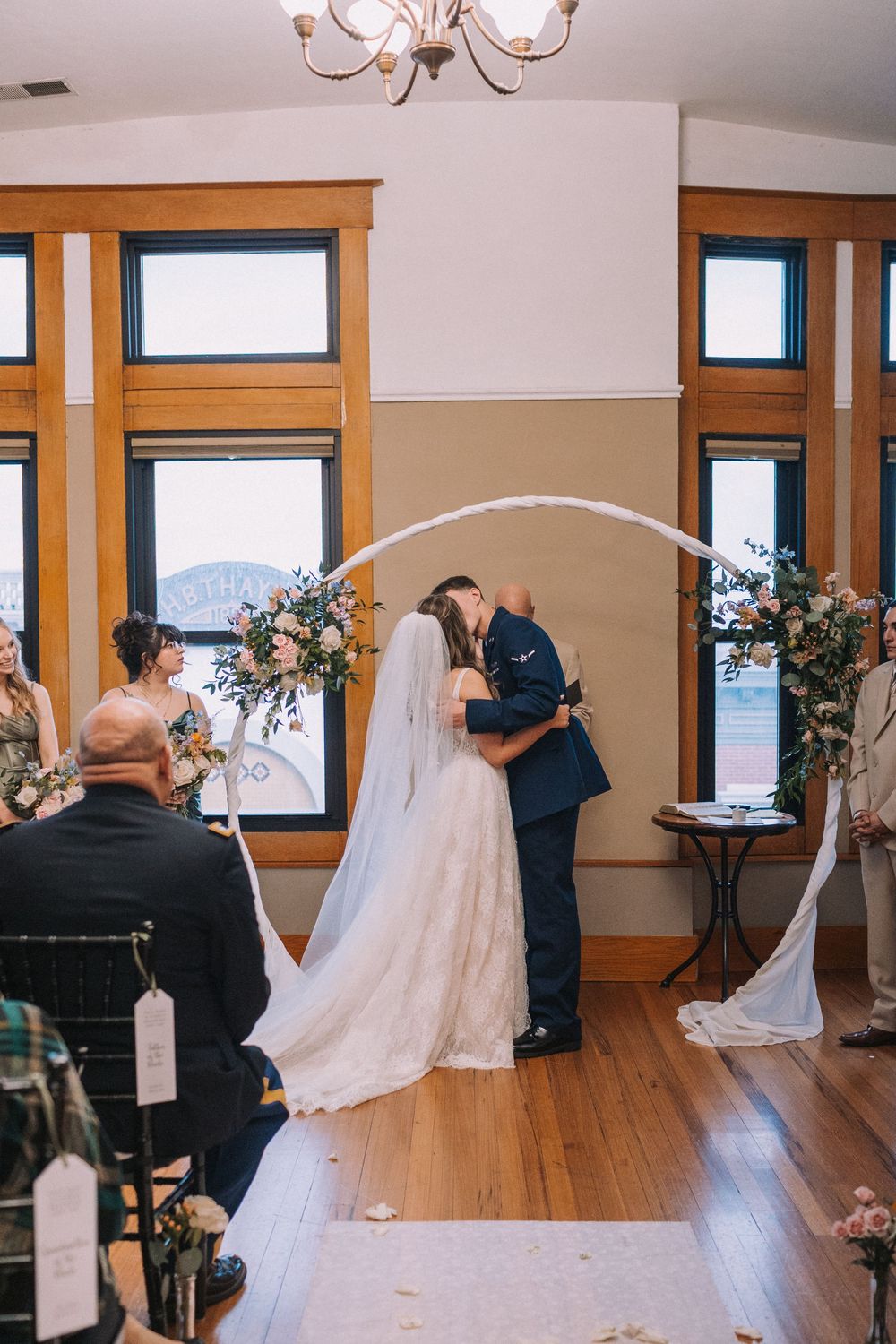Wedding ceremony captured in sequence showing couple exchanging vows.