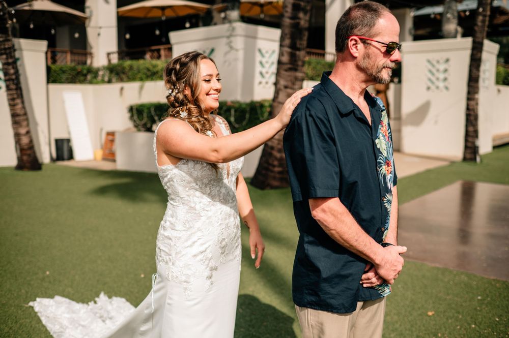 Emotional wedding reveal moment captured in a series of candid photographs.