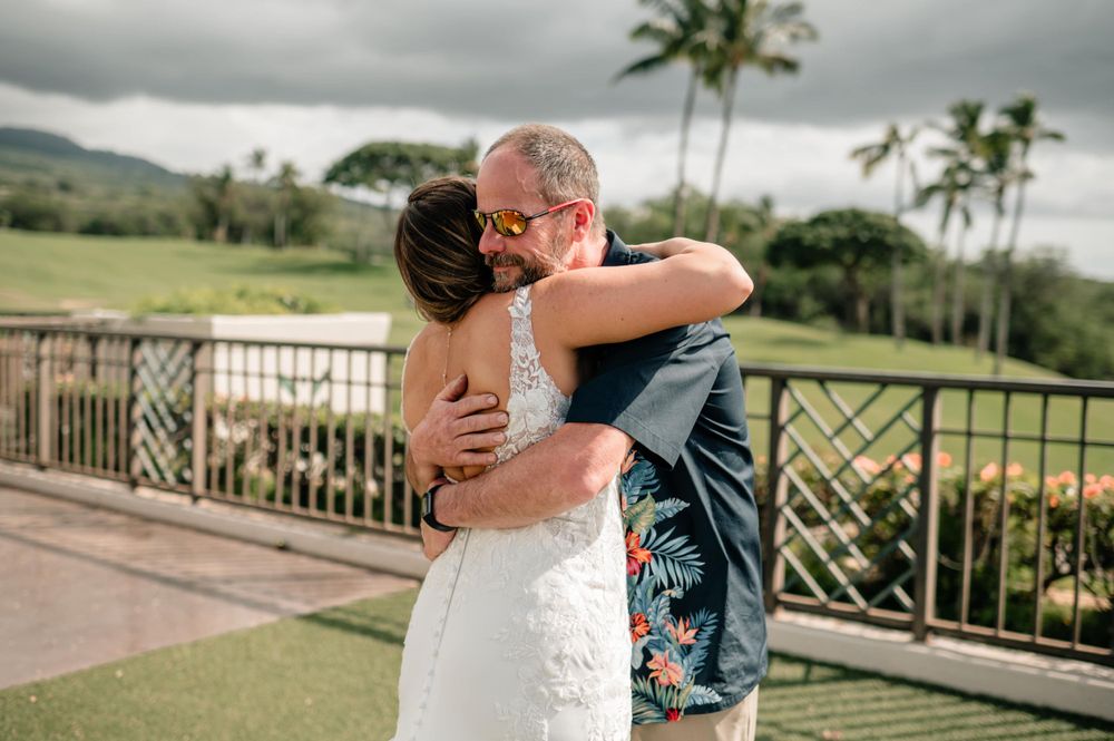 Intimate first look sequence on a tropical resort balcony with mountain views.