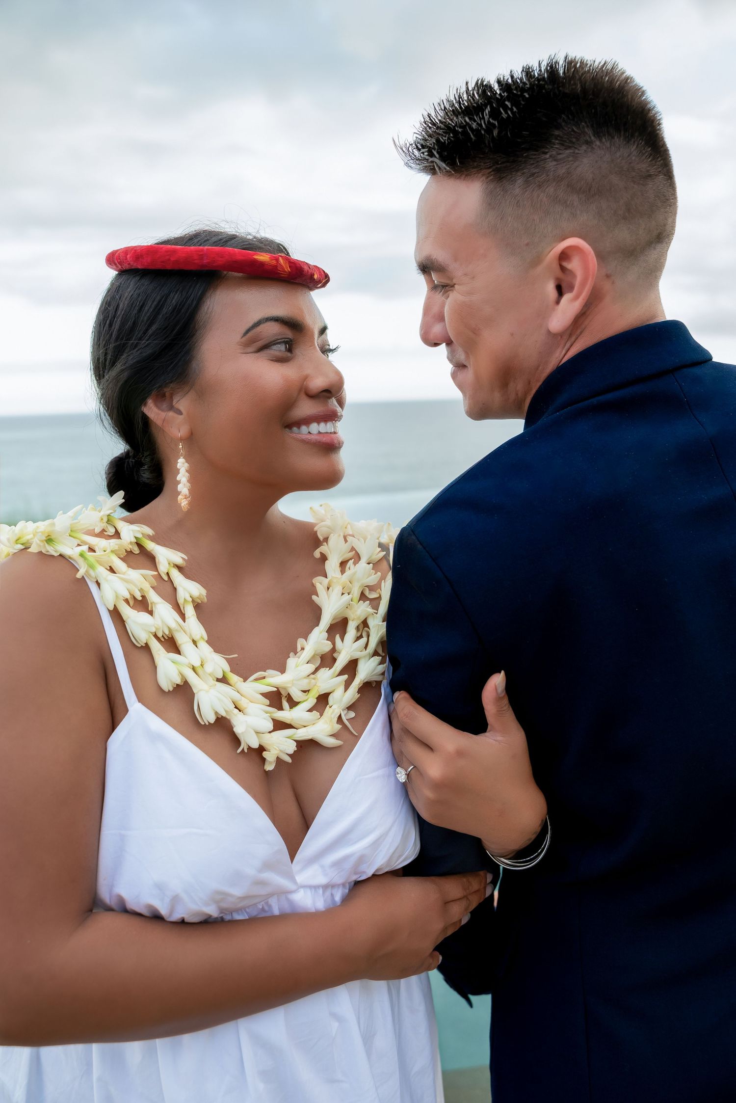 A couple shares romantic moments in a series of wedding photos with a scenic outdoor background.