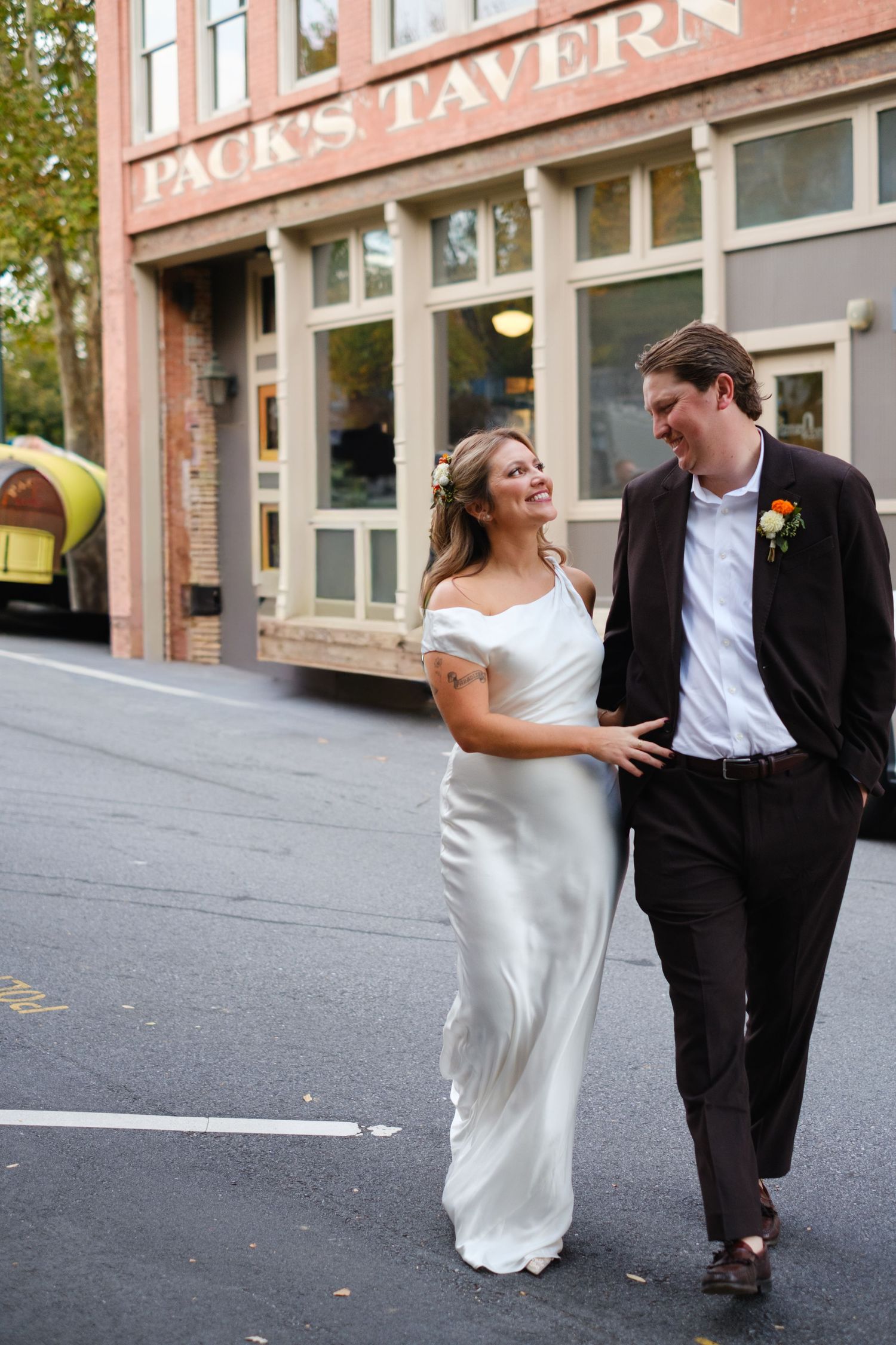 Bride and Groom out front of Packs Tavern for Wedding Photography by Stephanie A Smith Photography