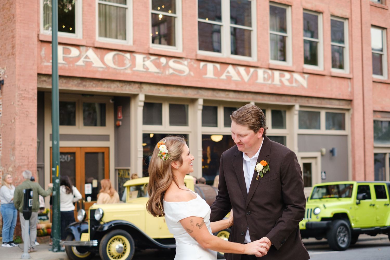 Bride and Groom out front of Packs Tavern for Wedding Photography by Stephanie A Smith Photography