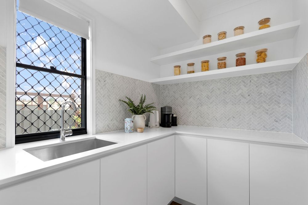 Light-filled modern kitchen captured by Gold Coast and Brisbane real estate photographer