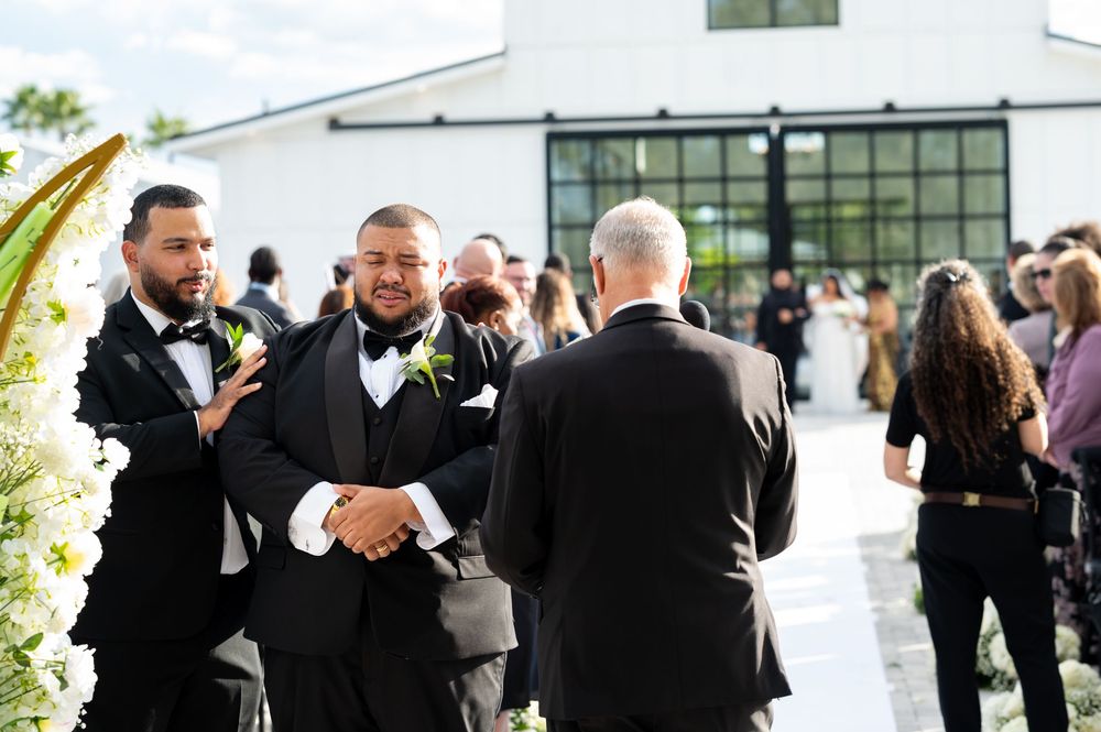 Groom waiting during a romantic Florida destination wedding ceremony