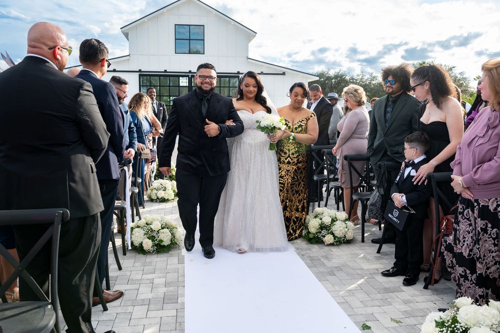 Bride walking down the aisle at a Scars Farm wedding in Florida