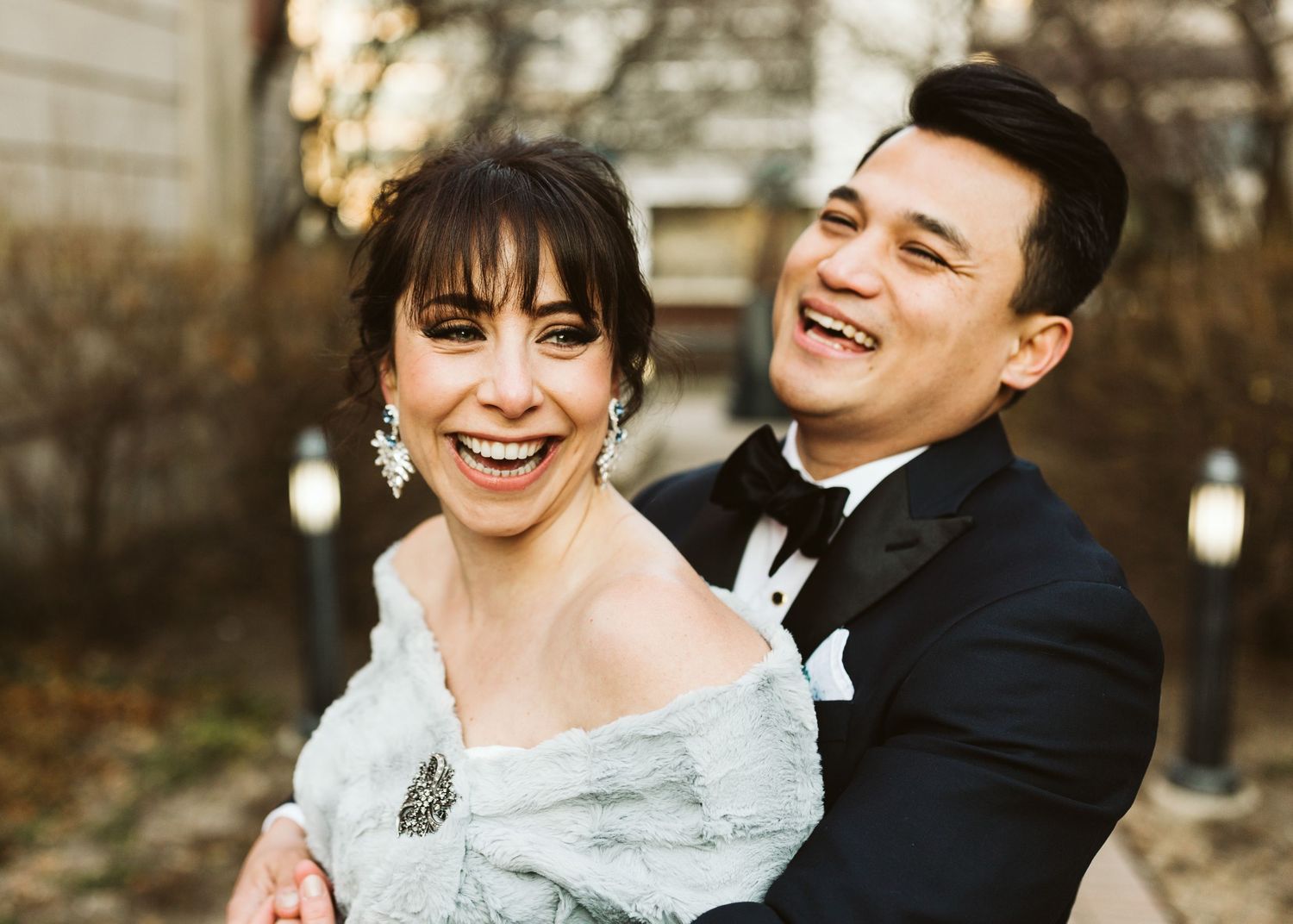 Romantic wedding portraits showing joyful moments in formal attire.