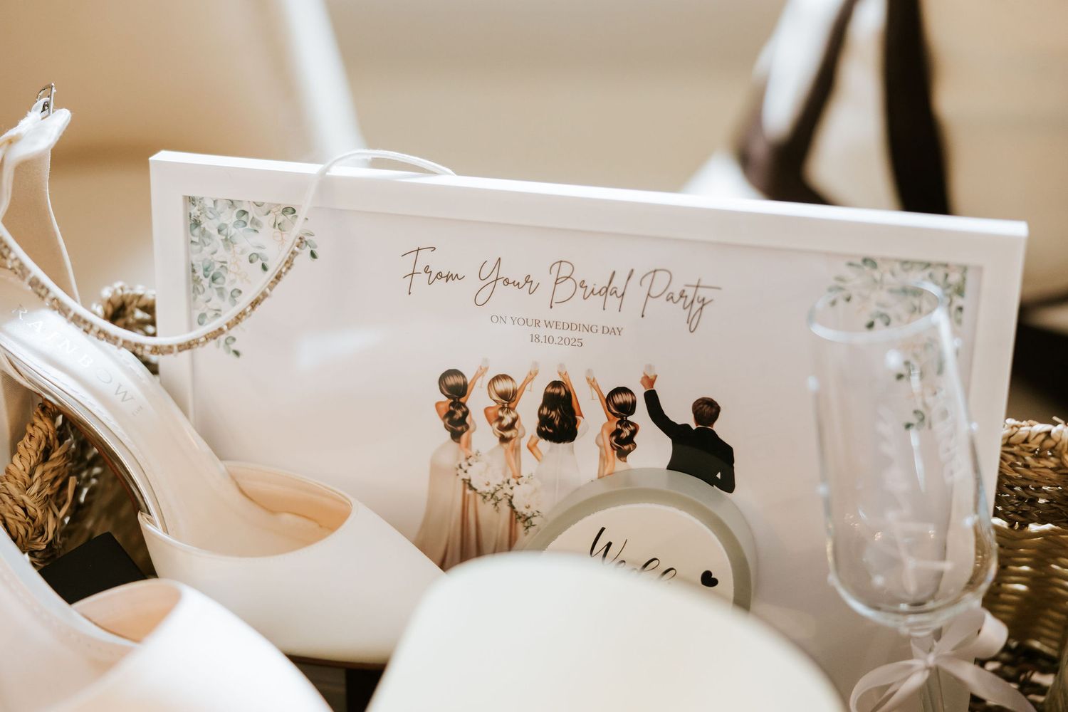 White place cards and table settings arranged for an elegant wedding reception with soft lighting.