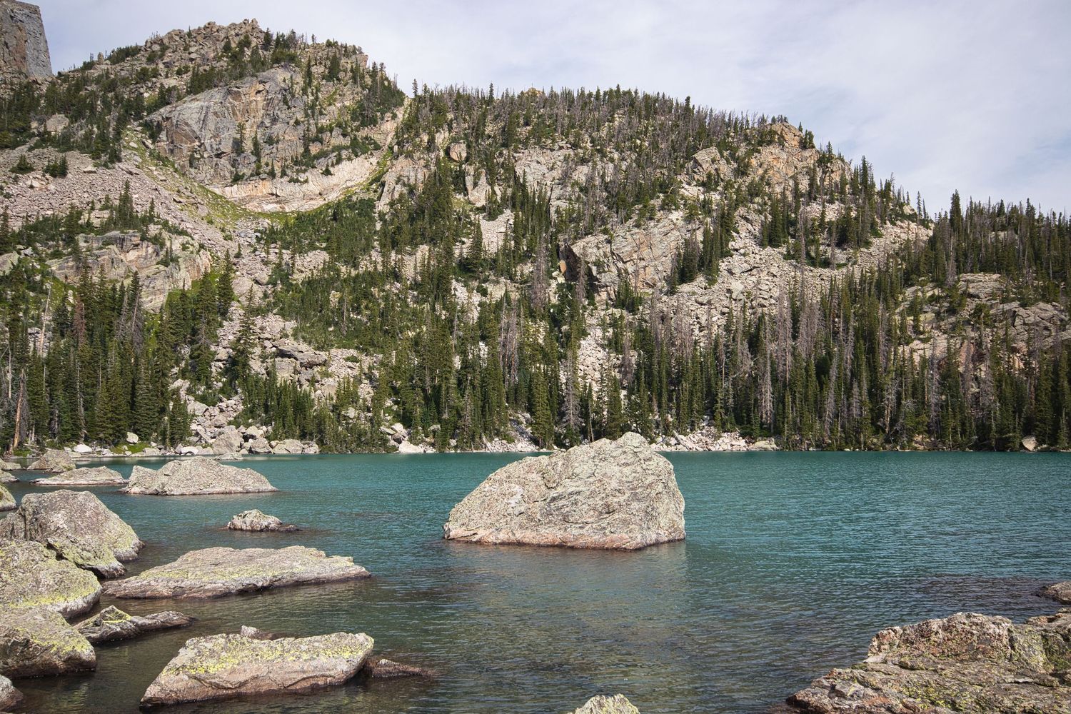 Turquoise waters of Lake Hiayaha in Rocky Mountain National Park. Pixcapades | The Rocky Mountain Proposal Photographer