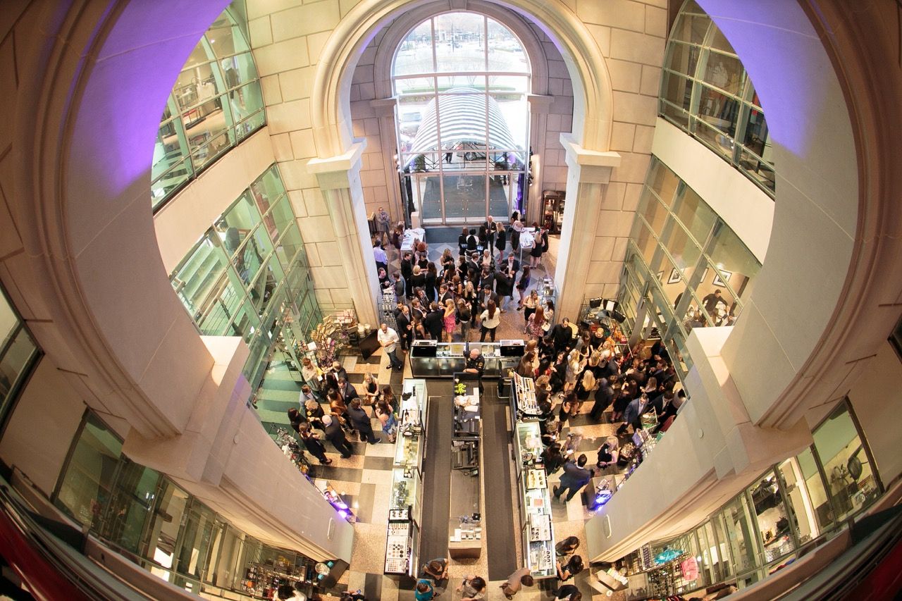 Aerial view of a busy multi-level shopping mall closed for a private event in downtown Dallas for Modern Luxury magazine