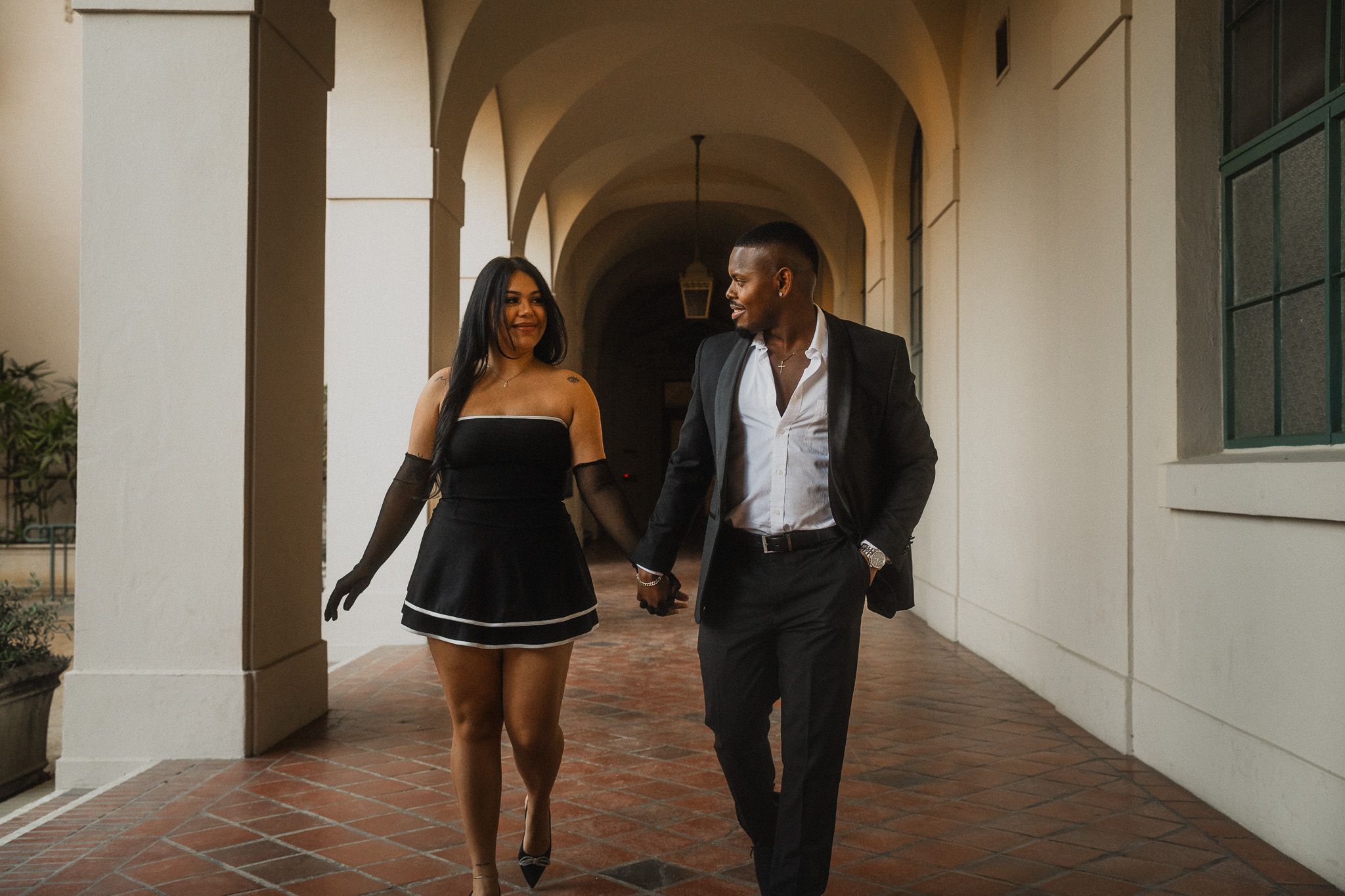 Yvonne & Sam holding hands at Pasadena City Hall Engagement Photoshoot