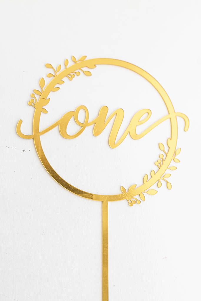 Gold mirror acrylic one cake topper for Murrieta first birthday photography.