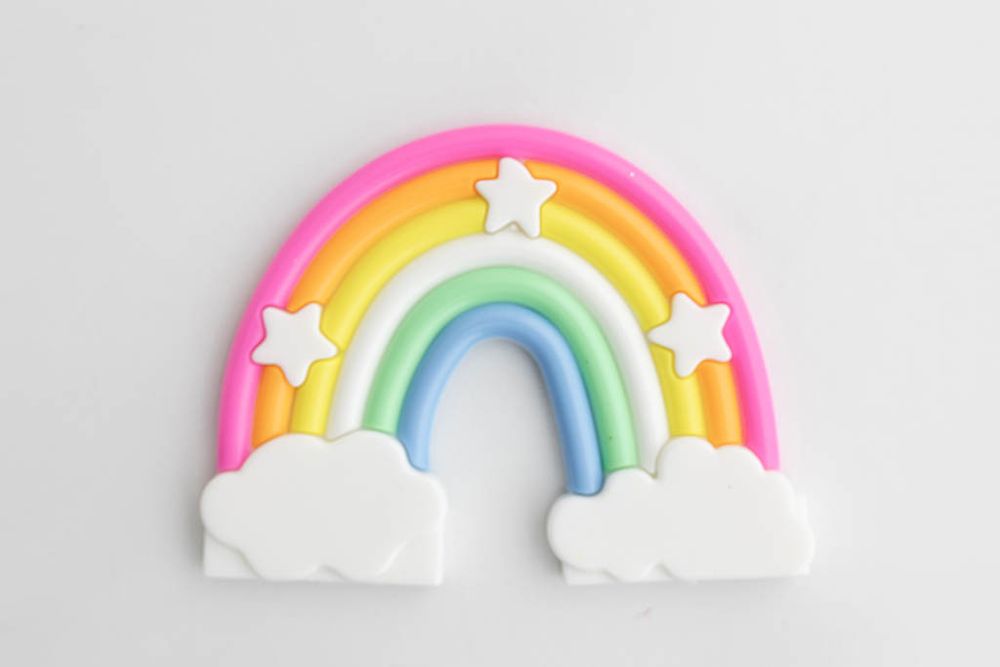 Colorful pastel rainbow cake topper for baby's cake smash session; Temecula professional baby photography studio.