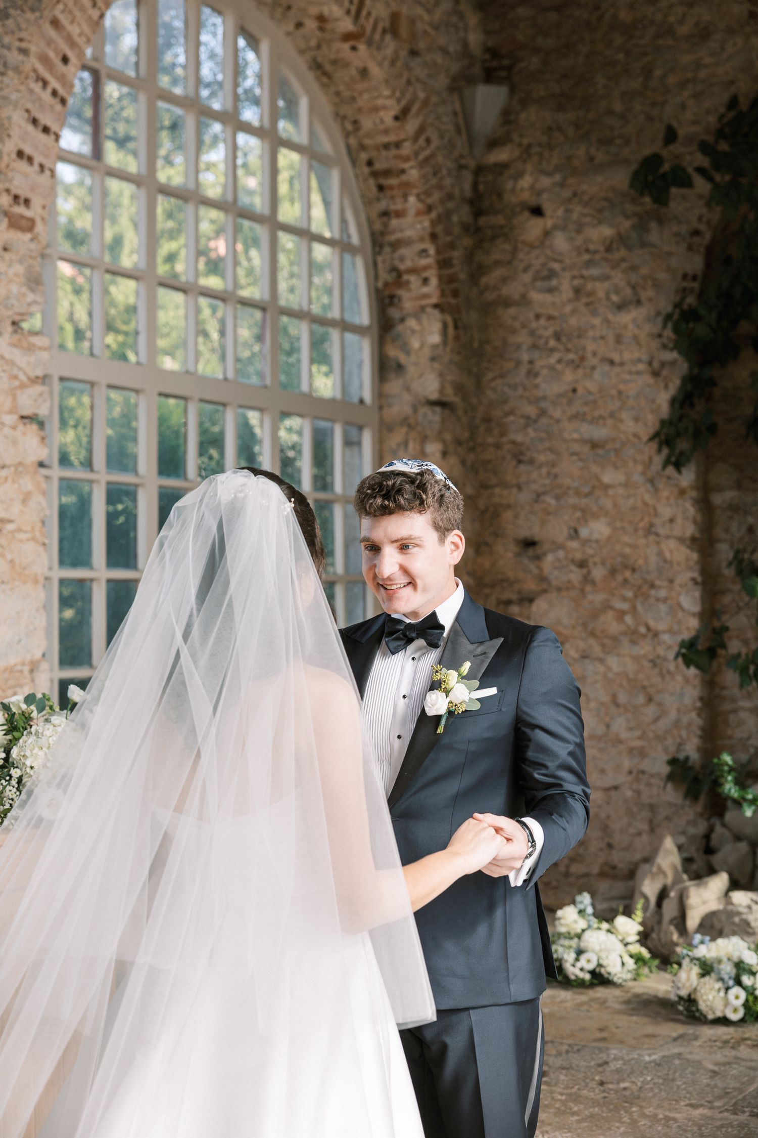 Couple first look moment filled with emotion at wedding in Cascais Portugal