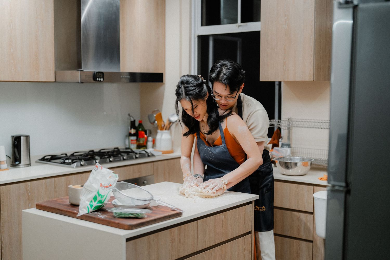 Cozy kitchen scene of cooking and baking together.