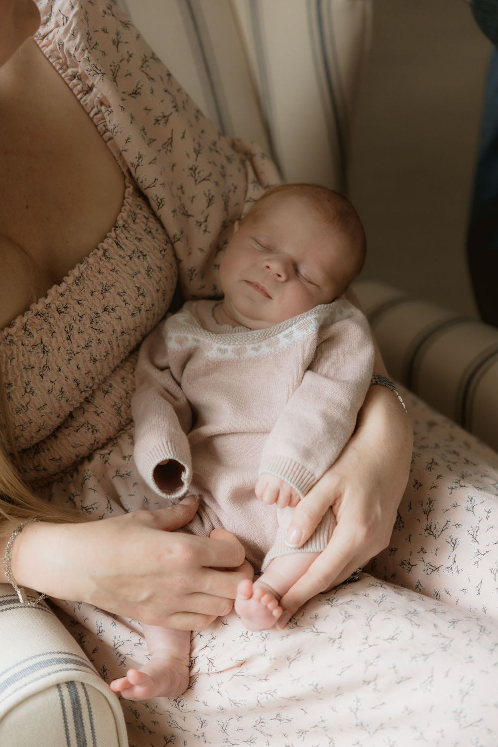 A sleeping newborn baby captured by Northamptonshire Newborn Photographer Ellen Sear