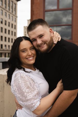 Couple sharing intimate moments in a series of casual outdoor portraits.