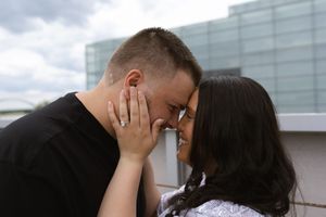 Series of romantic photos showing a couple sharing intimate moments against an urban backdrop.