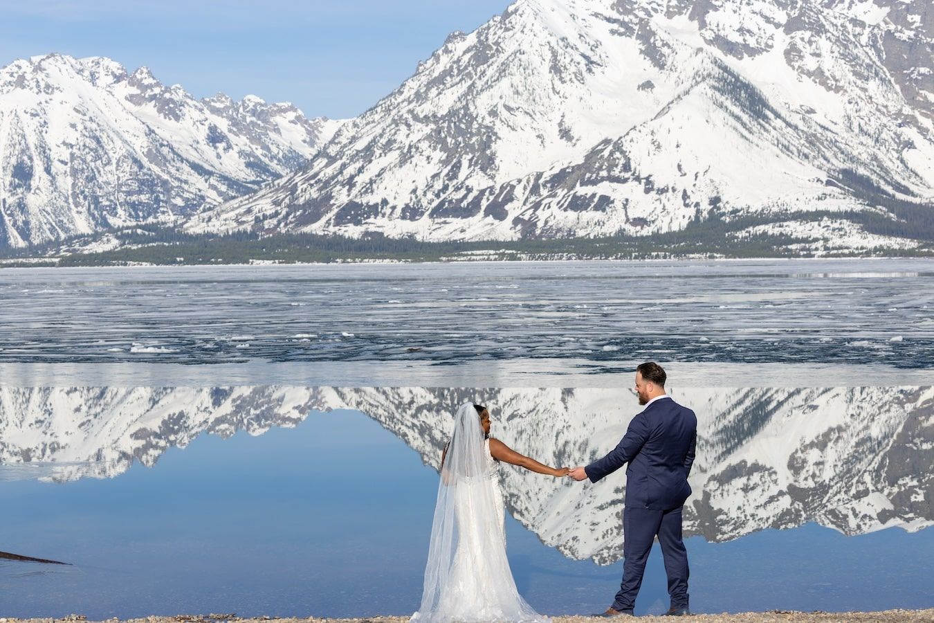winter like landscape and couple in grand    Tetons