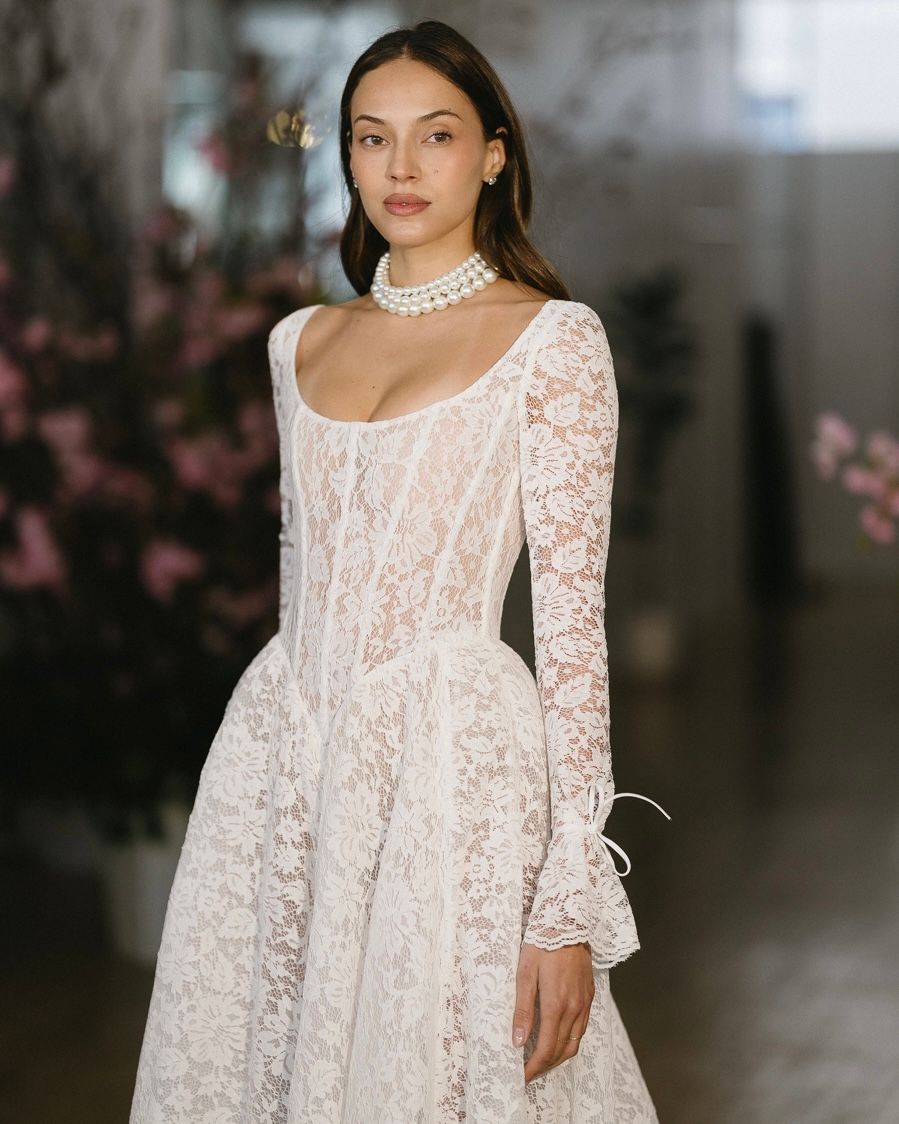 Elegant white lace maternity dress with long sleeves and empire waist shown from multiple angles.