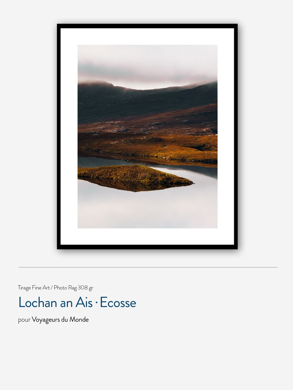 Scenic view of Lochan an Ais in Scotland with autumn colors reflecting on the tranquil lake waters and misty hills.