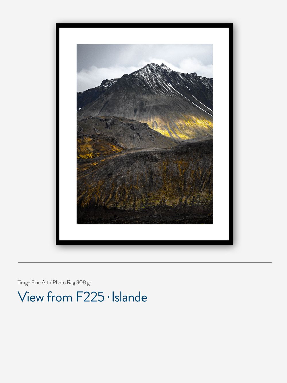 Framed fine art photo of a dramatic Icelandic mountain landscape with dark volcanic rock and golden light along route F225.
