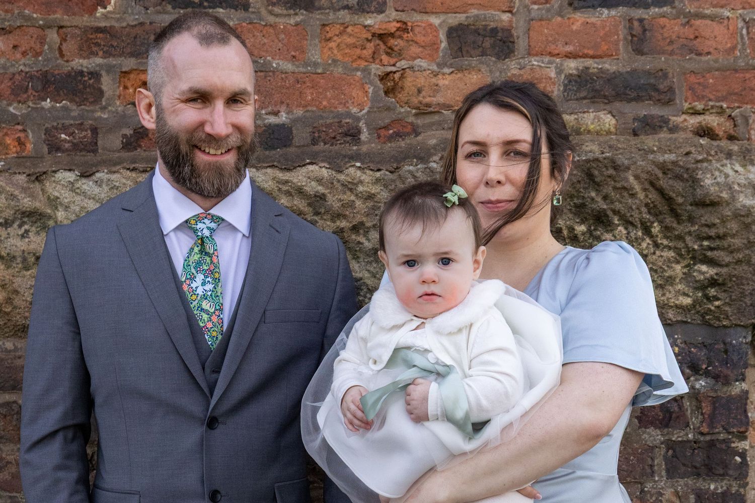 Dorothy and Johns son and daughter and their baby granddaughter during family wedding photos at Windmill Farm in Burscough.