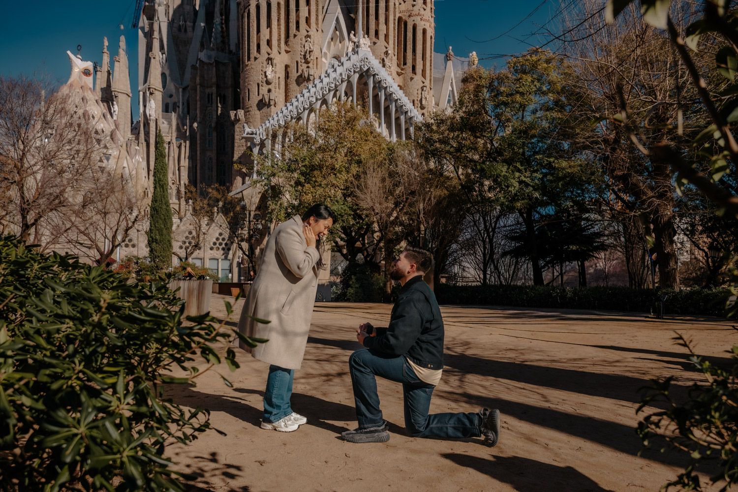 Engagement ring close up after proposal with Sagrada Familia in background